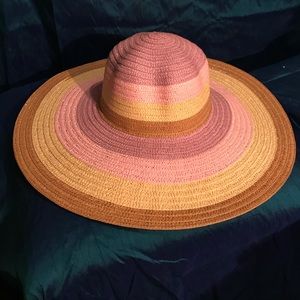 Swirling colorful summer/ beach straw hat.